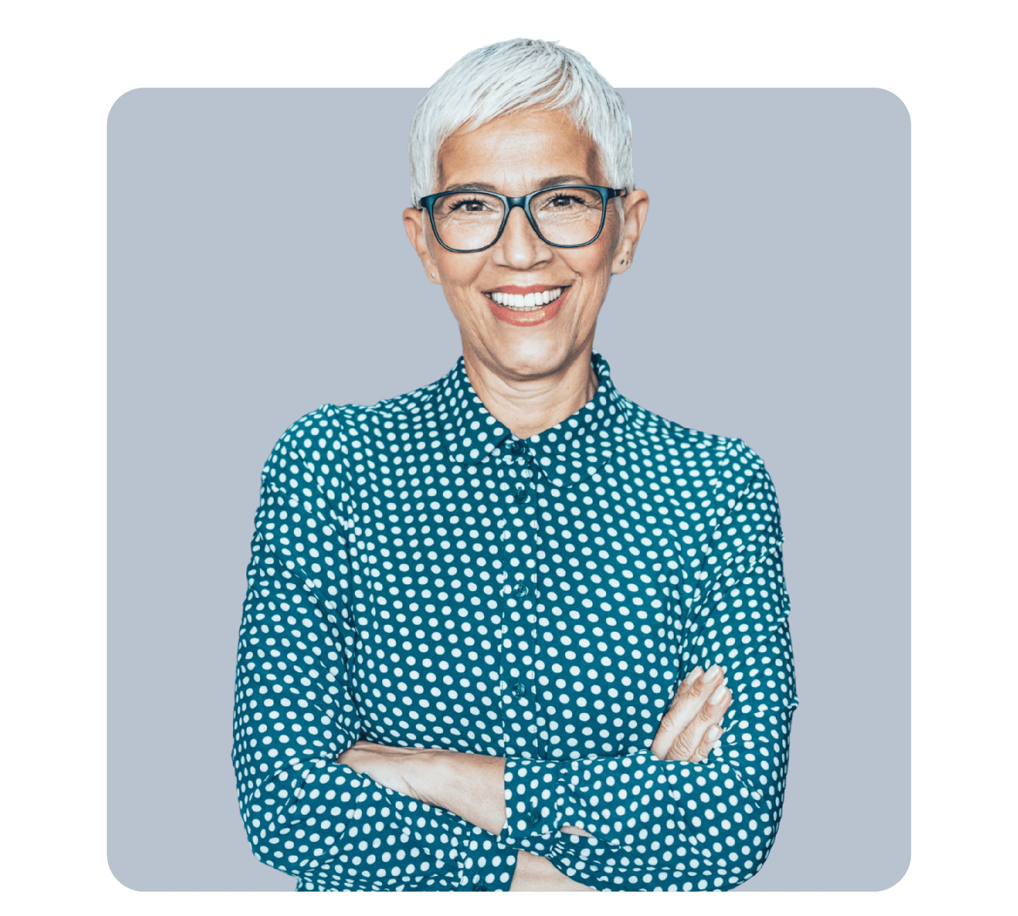 woman in blue blouse with white dots in front of gray square